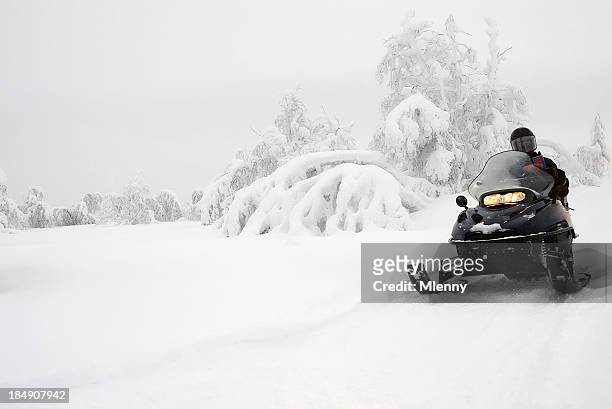 winter landschaft schneemobil-ausflug - snowmobiling stock-fotos und bilder