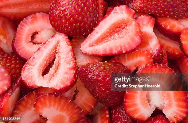 sugared strawberry slices - strawberry texture stock pictures, royalty-free photos & images