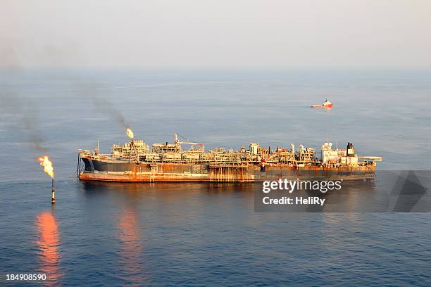 large fpso oil rig - oil rig fire stock pictures, royalty-free photos & images