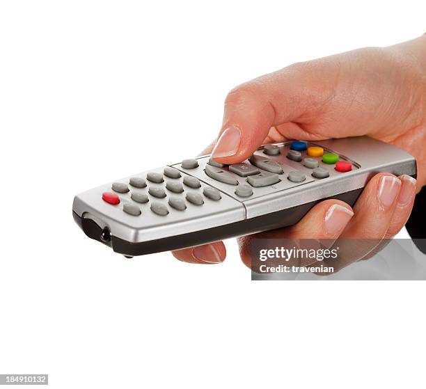 using remote - clipping path - multiple remote controls stock pictures, royalty-free photos & images