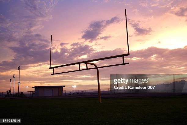silhouette football goal - football goal post stock pictures, royalty-free photos & images