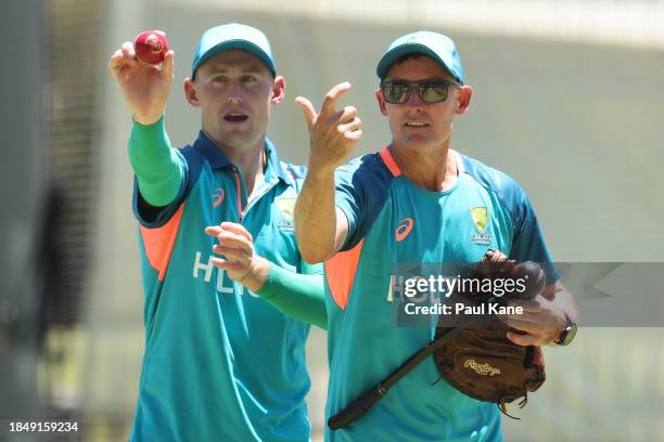 Marnus Labuschagne and Mike Hussey talk during an Australian nets session at Optus Stadium on December 12, 2023 in Perth, Australia.