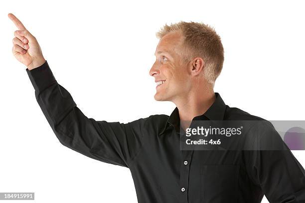 close-up of a man pointing upward - hand opsteken stockfoto's en -beelden