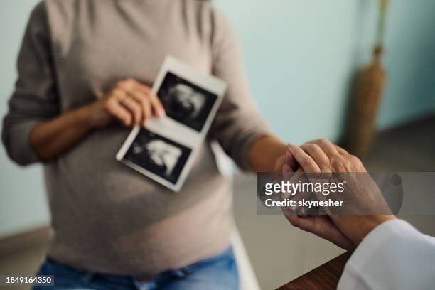 caring for a pregnant patient! - scientific imaging technique stock pictures, royalty-free photos & images