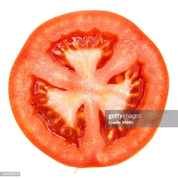 una mitad de tomate - partes fotografías e imágenes de stock