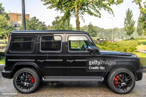 mercedes-benz amg g 63 suv all terrain performance car - mercedes benz g class stock pictures, royalty-free photos & images