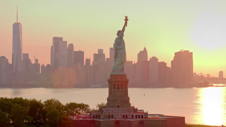 https://media.gettyimages.com/id/1849237497/video/aerial-around-the-statue-of-liberty-on-liberty-island-nyc-at-sunrise.jpg?b=1&s=640x640&k=20&c=pX8ExGMOeaV65dJa0Pww12D3fH2XaBeGvmK9oToJJKI=