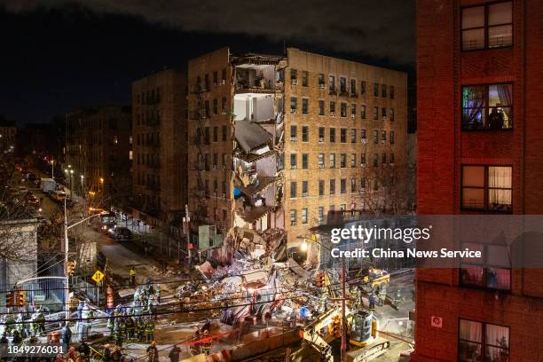 View of the site of a partially collapsed residential building on December 11, 2023 in New York City. Part of a seven-story residential building in...