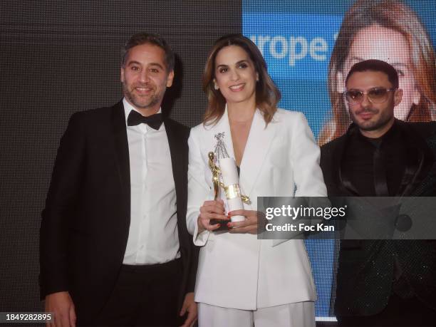 Julien Benedetto, Sonia Mabrouk and singer Grégory Bakian attend the 46th "The Bests" Gala at Four Seasons Hotel on December 11, 2023 in Paris,...