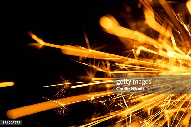 sparkler - spark creativity stock pictures, royalty-free photos & images