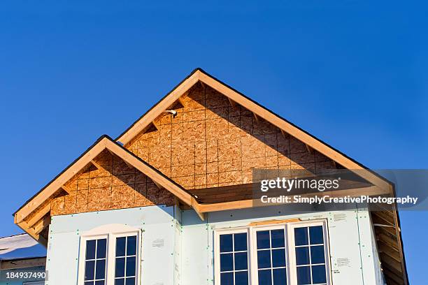 new house construction - insulation stock pictures, royalty-free photos & images