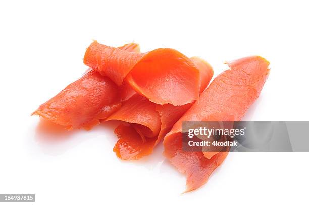 very thin strips of smoked salmon  - smoked salmon stock pictures, royalty-free photos & images