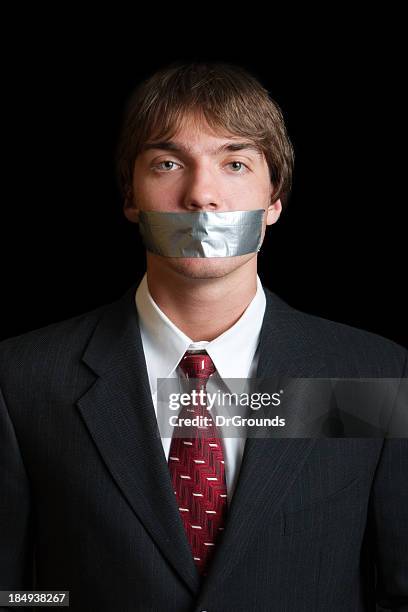 silence - word of mouth stock pictures, royalty-free photos & images