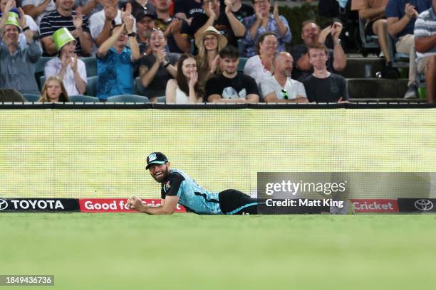 Michael Neser of the Heat celebrates taking a catch to dismiss Alex Ross of the Thunder during the BBL match between Sydney Thunder and Brisbane Heat...