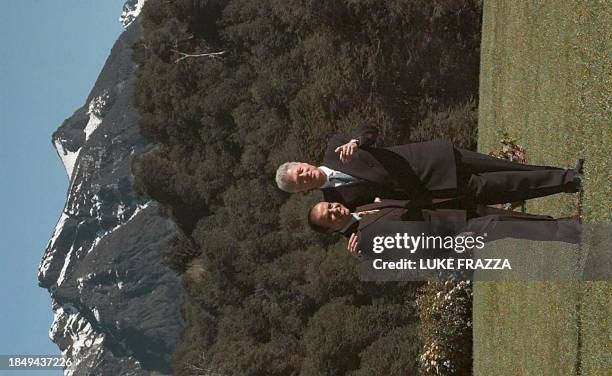 President Bill Clinton and Argentine President Carlos Menem stand 18 October in front of the the Andes mountains in San Carlos de Bariloche,...