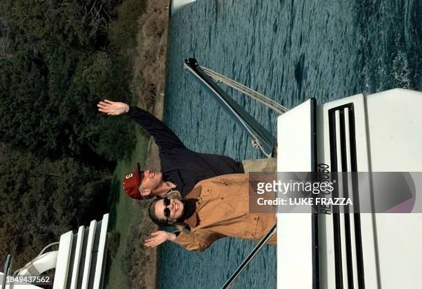 President Bill Clinton and First Lady Hillary Clinton ride a boat 17 October on Lake Nahuel Huapi on their way to the Quetrihue Forest in San Carlos...