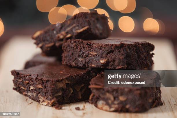 close-up view of a batch of chocolate brownies - brownie stock pictures, royalty-free photos & images