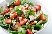 Green salad with strawberries and spinach
