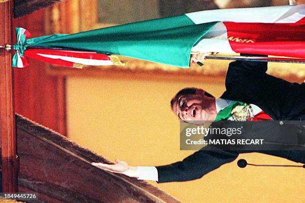 Mexican President Ernesto Zedillo screams "Viva Mexico" 15 September from the balcony of the Presidential Palace, which is located in front of Mexico...
