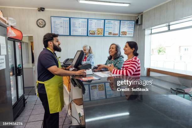 making an order at a takeaway - fast food register stock pictures, royalty-free photos & images