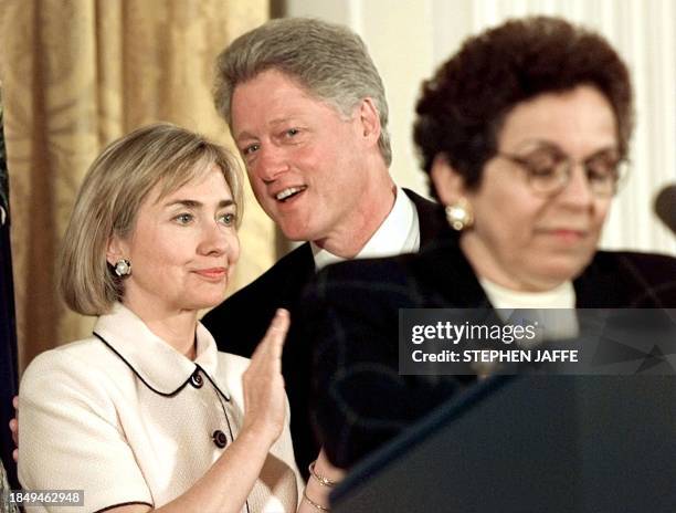 Secretary of Health and Human Services Donna Shalala speaks before US President Bill Clinton and First Lady Hillary Rodham Clinton announce in at the...