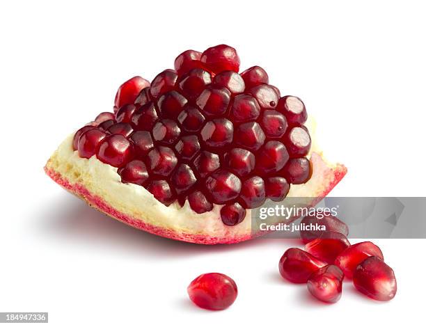 piece of pomegranate - pomegranate stock pictures, royalty-free photos & images