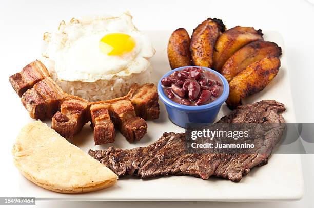 bandeja paisa (colombian food) - plantain stock pictures, royalty-free photos & images