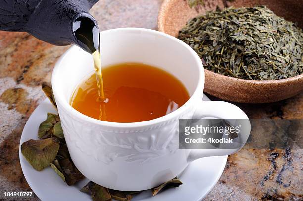 green tea - teapot stock pictures, royalty-free photos & images