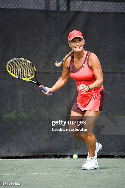 mature woman tennis player - female tennis player stock pictures, royalty-free photos & images