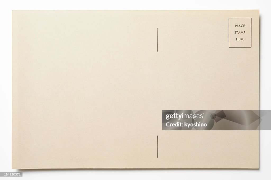 Isolated shot of antique postcard on white background