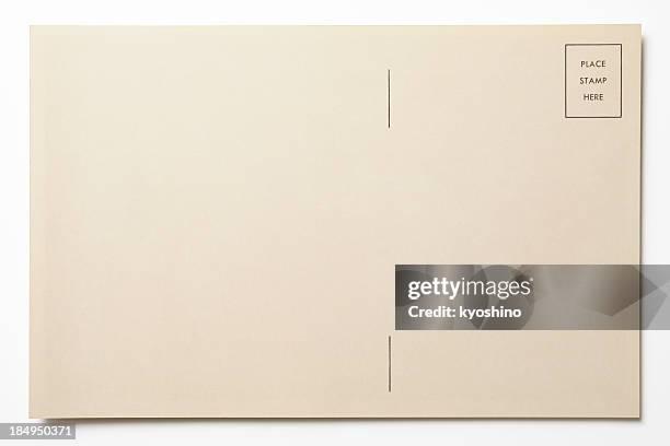 isolated shot of antique postcard on white background - postcard stock pictures, royalty-free photos & images