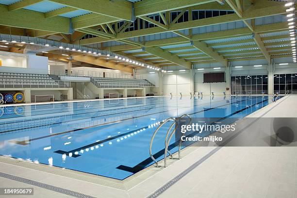 indoor swimming pool - public pool stock pictures, royalty-free photos & images