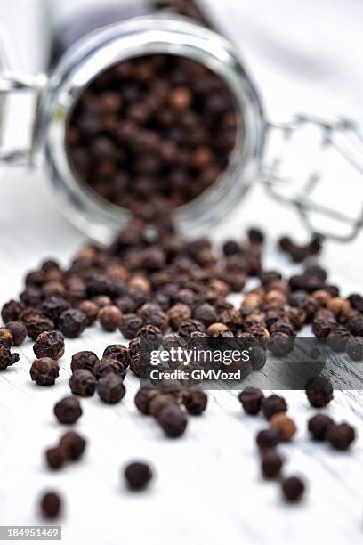 black peppercorns - black peppercorn stock pictures, royalty-free photos & images