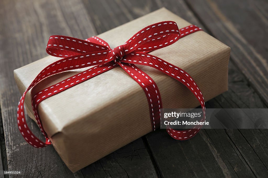 Gift box on an old wooden background