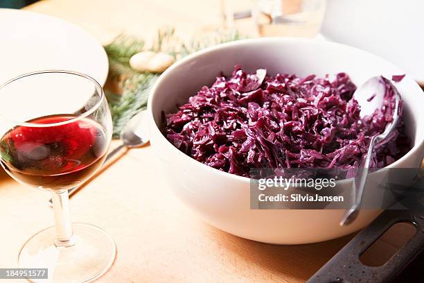 red cabbage in a bowl - red cabbage stock pictures, royalty-free photos & images