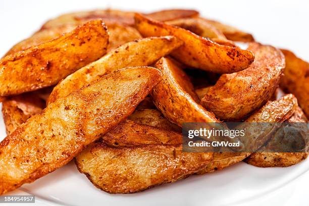potato wedges - potato wedges stock pictures, royalty-free photos & images