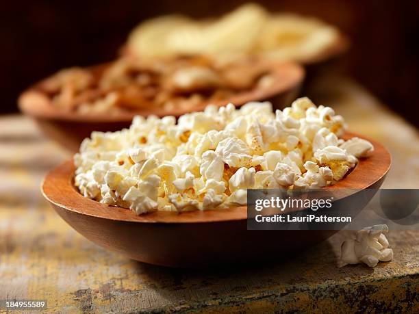 buttered popcorn - salty snack stock pictures, royalty-free photos & images