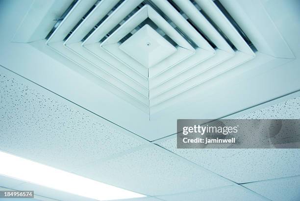 air conditioner vent close up in ceiling - ceiling vent stock pictures, royalty-free photos & images
