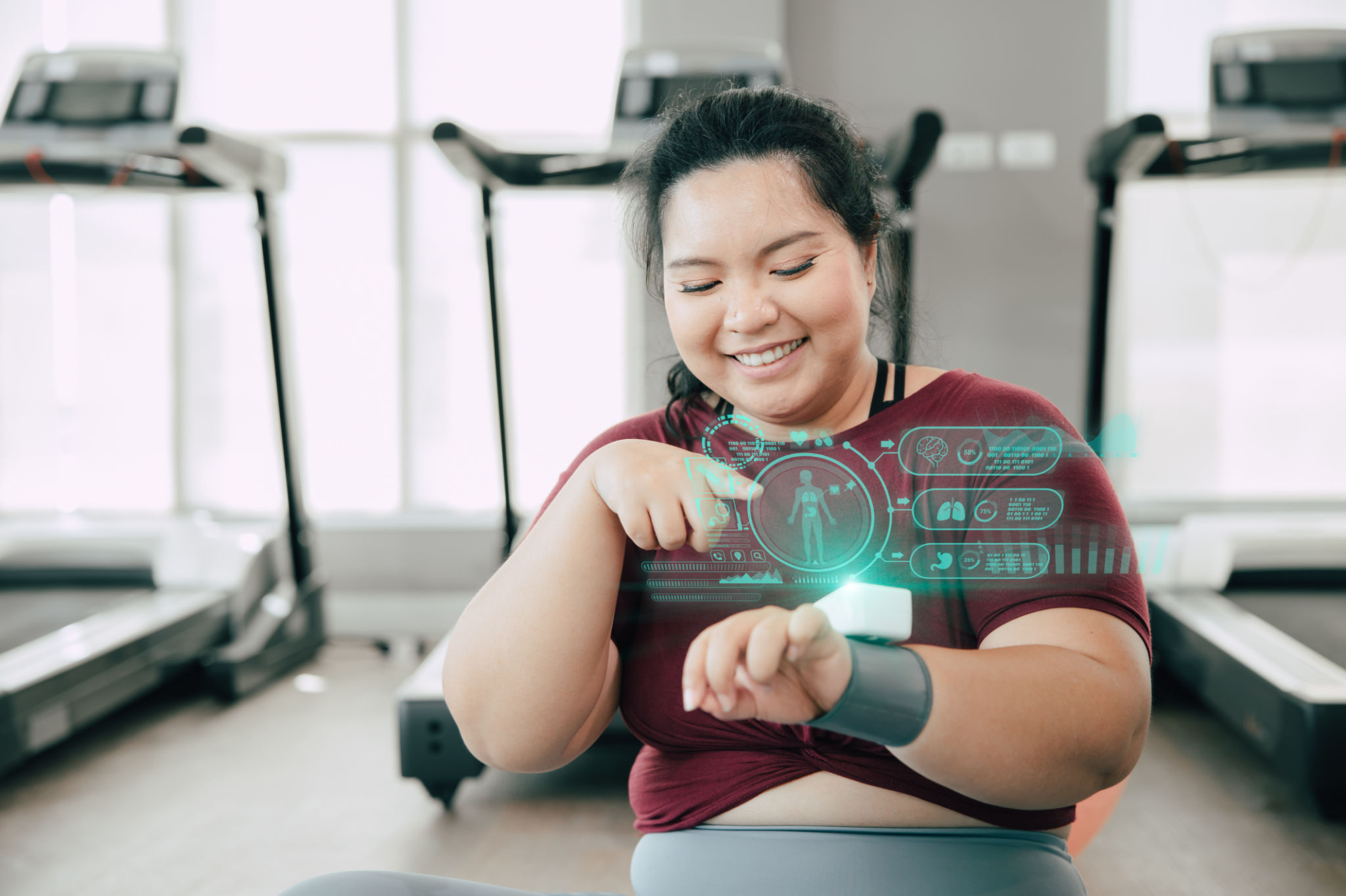 healthy fat women happy using smart wearable science technology device fitness trackers display hologram body insight activity information. healthy fat women happy using smart wearable science technology device fitness trackers display hologram body insight activity information.