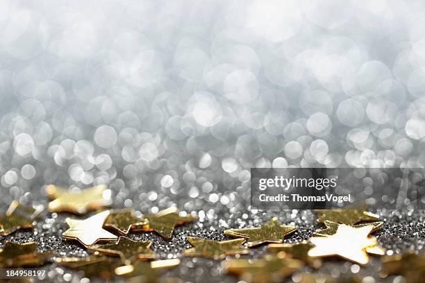 abstract glitter background with stars - christmas party star - silverstars stock pictures, royalty-free photos & images