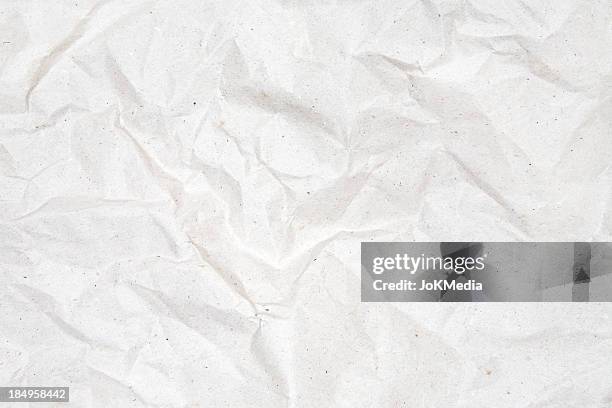crumpled gray paper background - wrapping paper texture stock pictures, royalty-free photos & images
