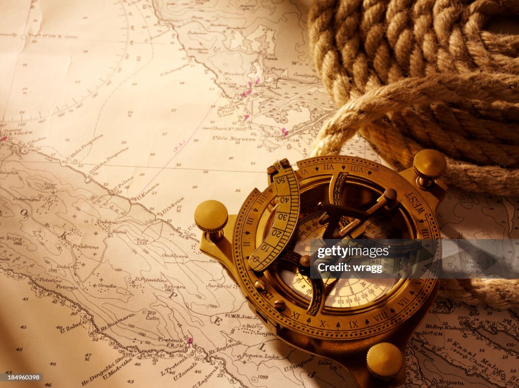 Sea Compass Rope Coiled Rope And Nautical Chart With A Compass High-Res Stock Photo ...