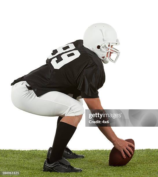 american football player on playground - american football uniform stock pictures, royalty-free photos & images