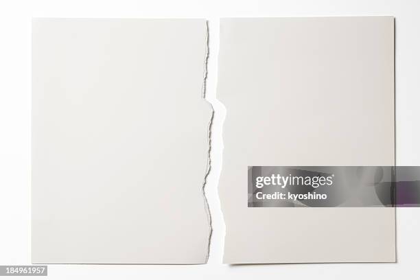 isolated shot of torn white paper on white background - ripped paper stock pictures, royalty-free photos & images