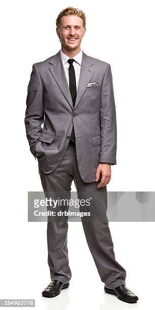 sorridente uomo in tuta posa - grey suit foto e immagini stock