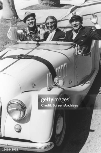 Mel Brooks, Dom DeLuise and Marty Feldman drive a 1954 Morgan Plus car in a scene from the 1976 comedy 'Silent Movie'.