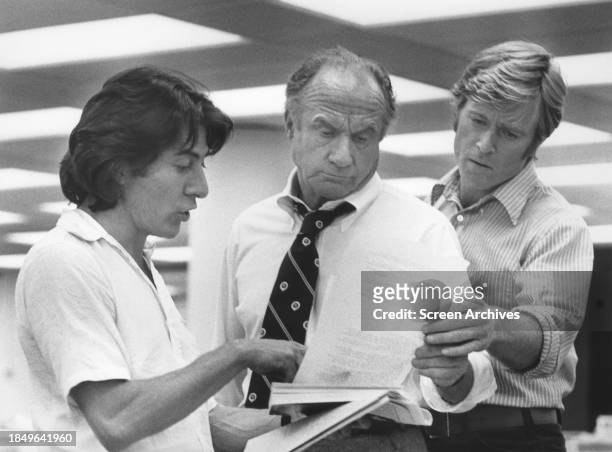 Robert Redford, Dustin Hoffman and Jack Warden in a scene from the 1976 film 'All The President's Men'.