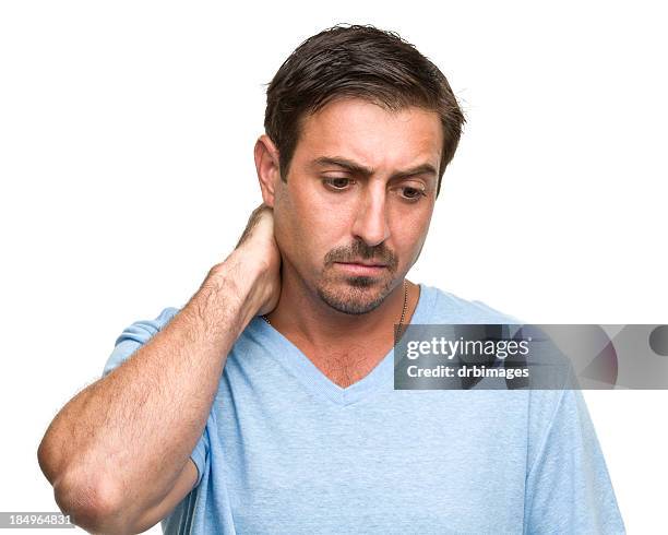 stressed man rubs neck - hands behind head stock pictures, royalty-free photos & images