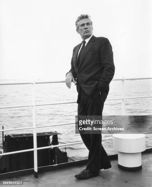 Peter Finch pictured on the Isle of Wight ferry during filming the 1972 thriller 'Something to Hide'.