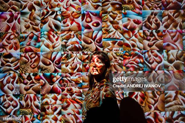 Maude Huysmans, one of the organizers of the exhibit and organizer of Club Sexu, poses for a portrait during an artificial intelligence exhibition...
